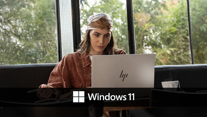 image of woman working with HP laptop