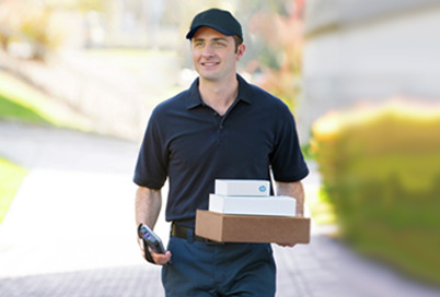 delivery guy carrying HP products.