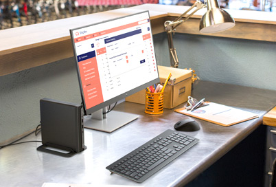 a business laptop in a small business desk