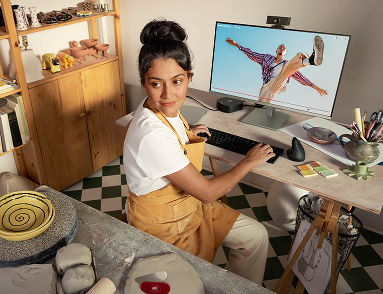 A girl working on hp pc