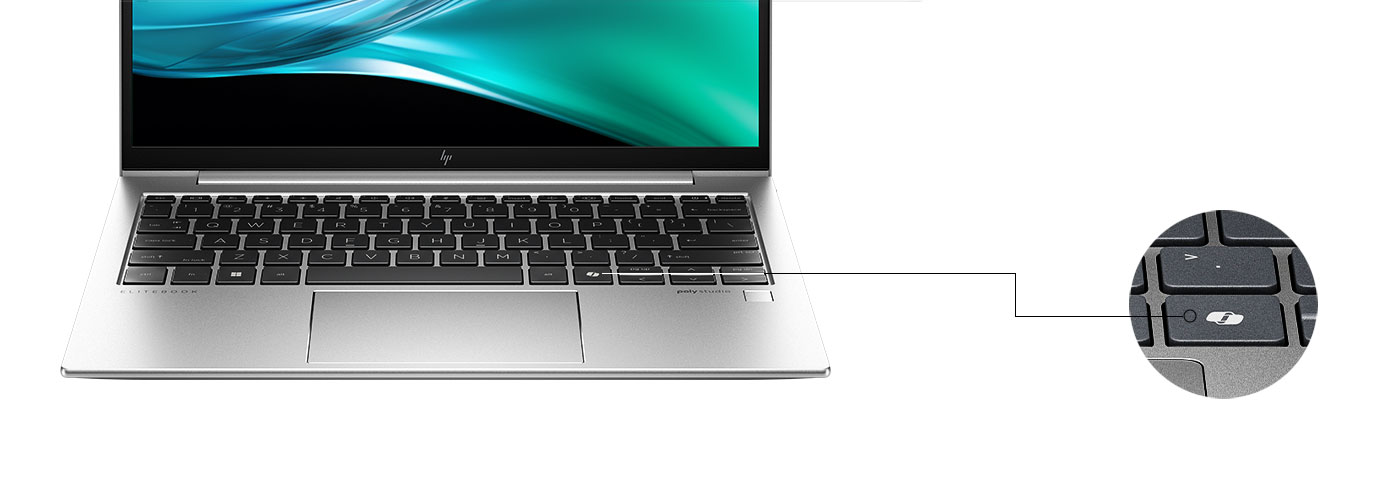 A silver laptop with a backlit keyboard, featuring a highlighted Ai Key.